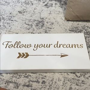 gold writing sign